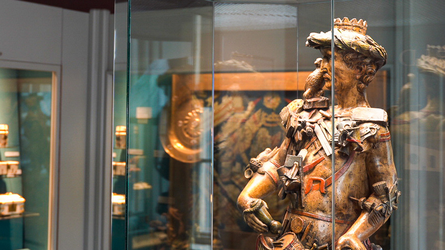 Image of a statue in a glass case