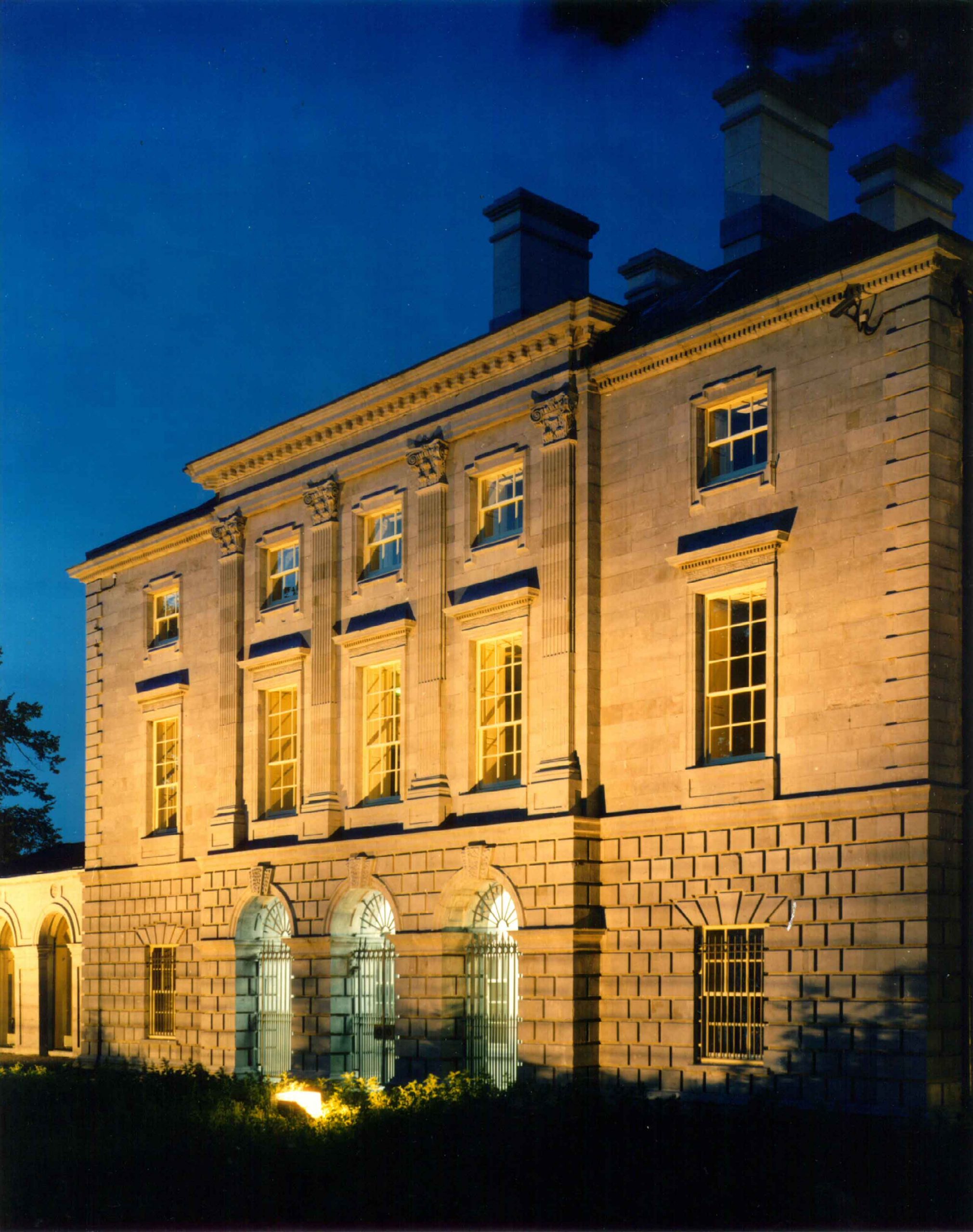Corporate Support. Hunt Museum in the evening lit from underneath by some lights on the ground. Corporate Support