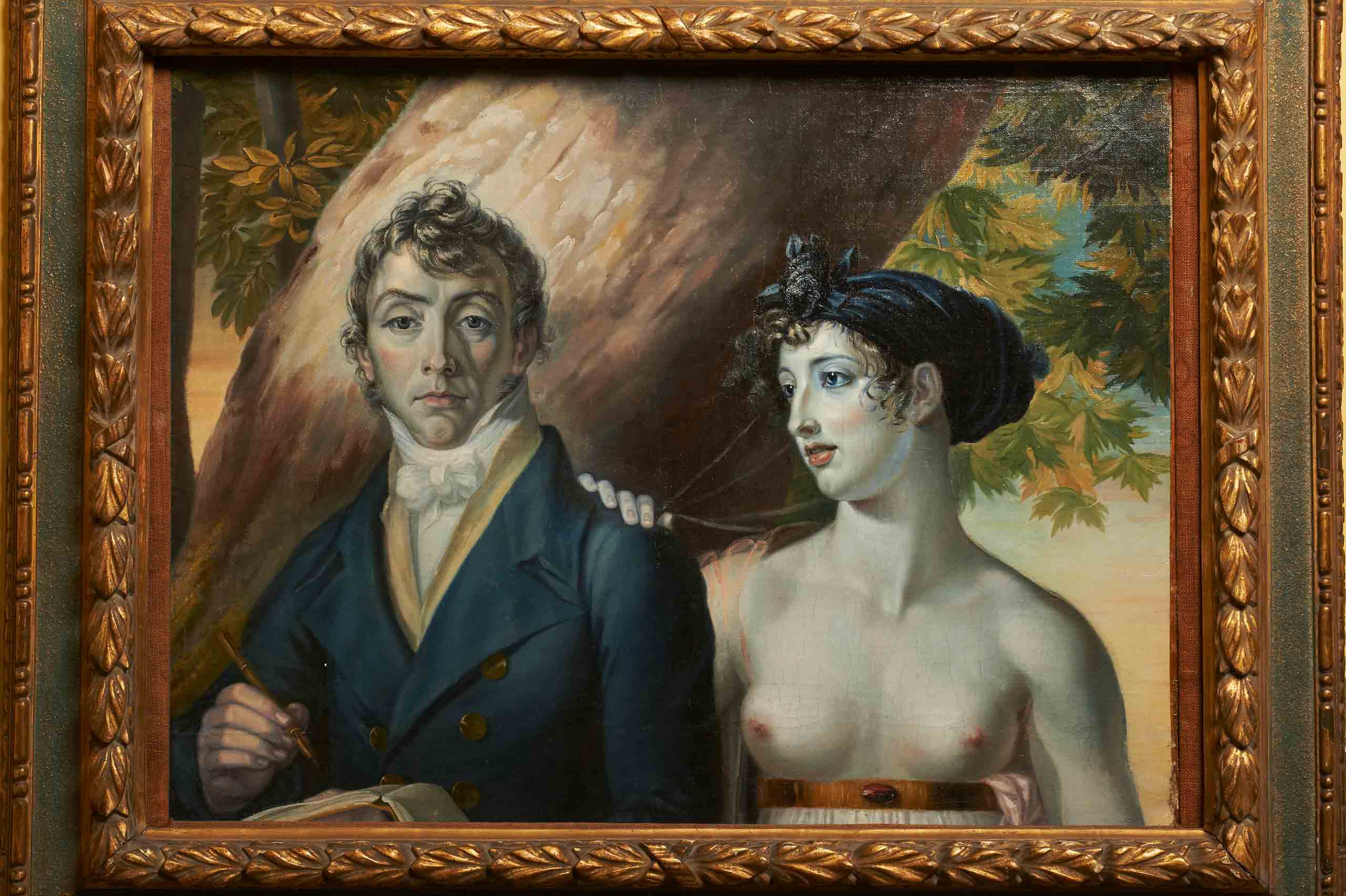 Painting of man in a suit and topless woman with a blue headscarf in front of a tree