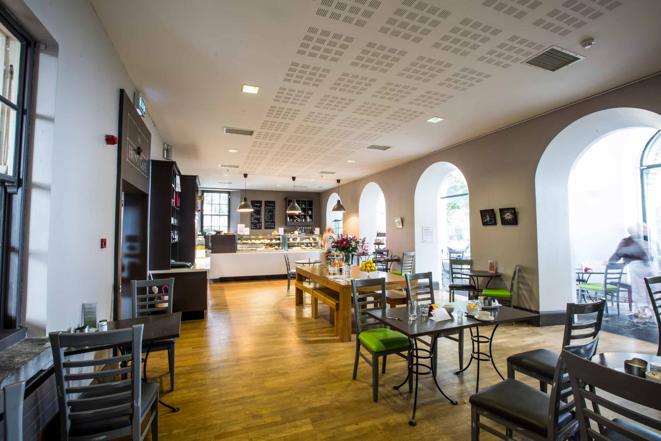 Interior of the Hunt Cafe facing towards the arches and till area