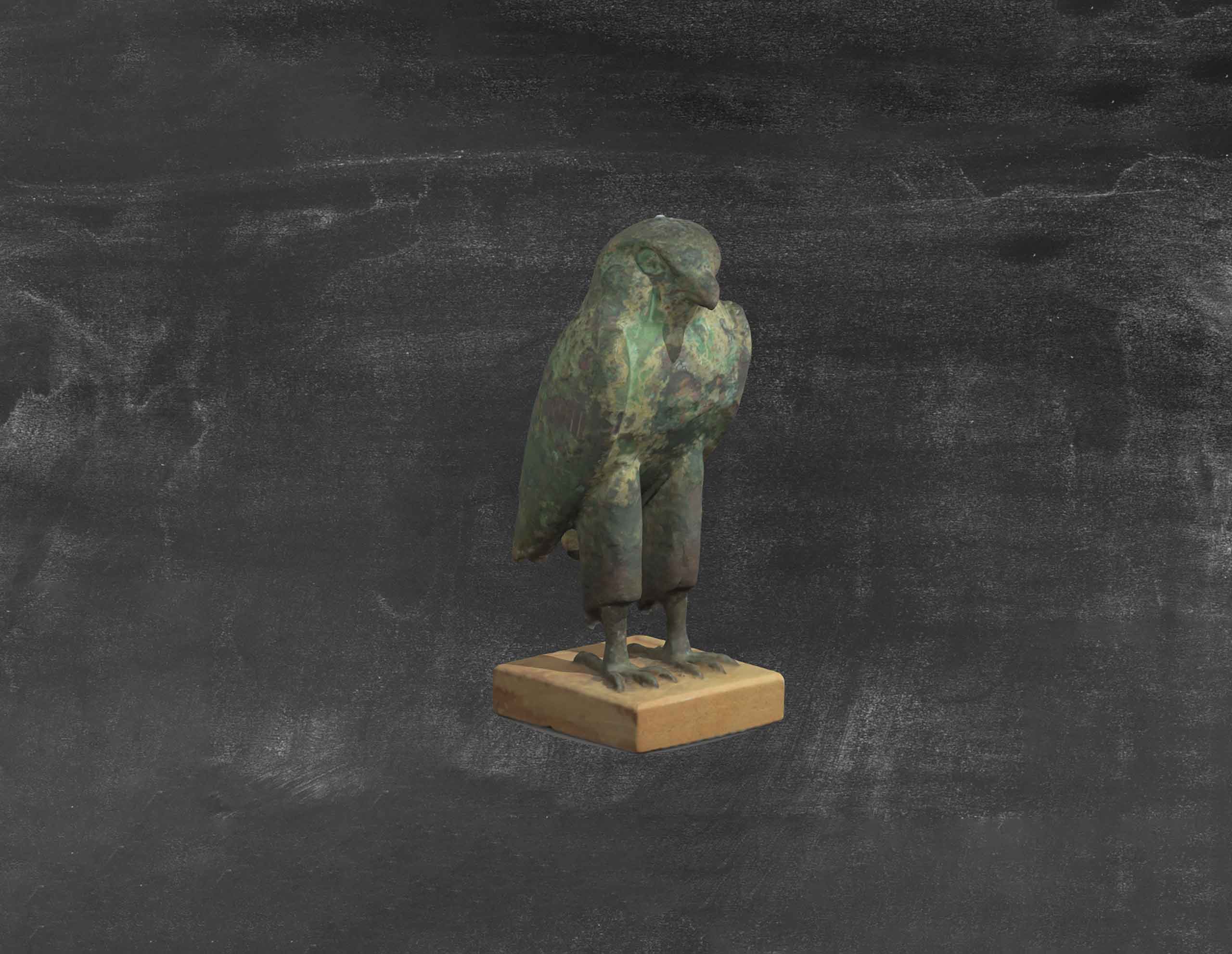 3D Library. 3D Library. Statuette of a bird on a grey background