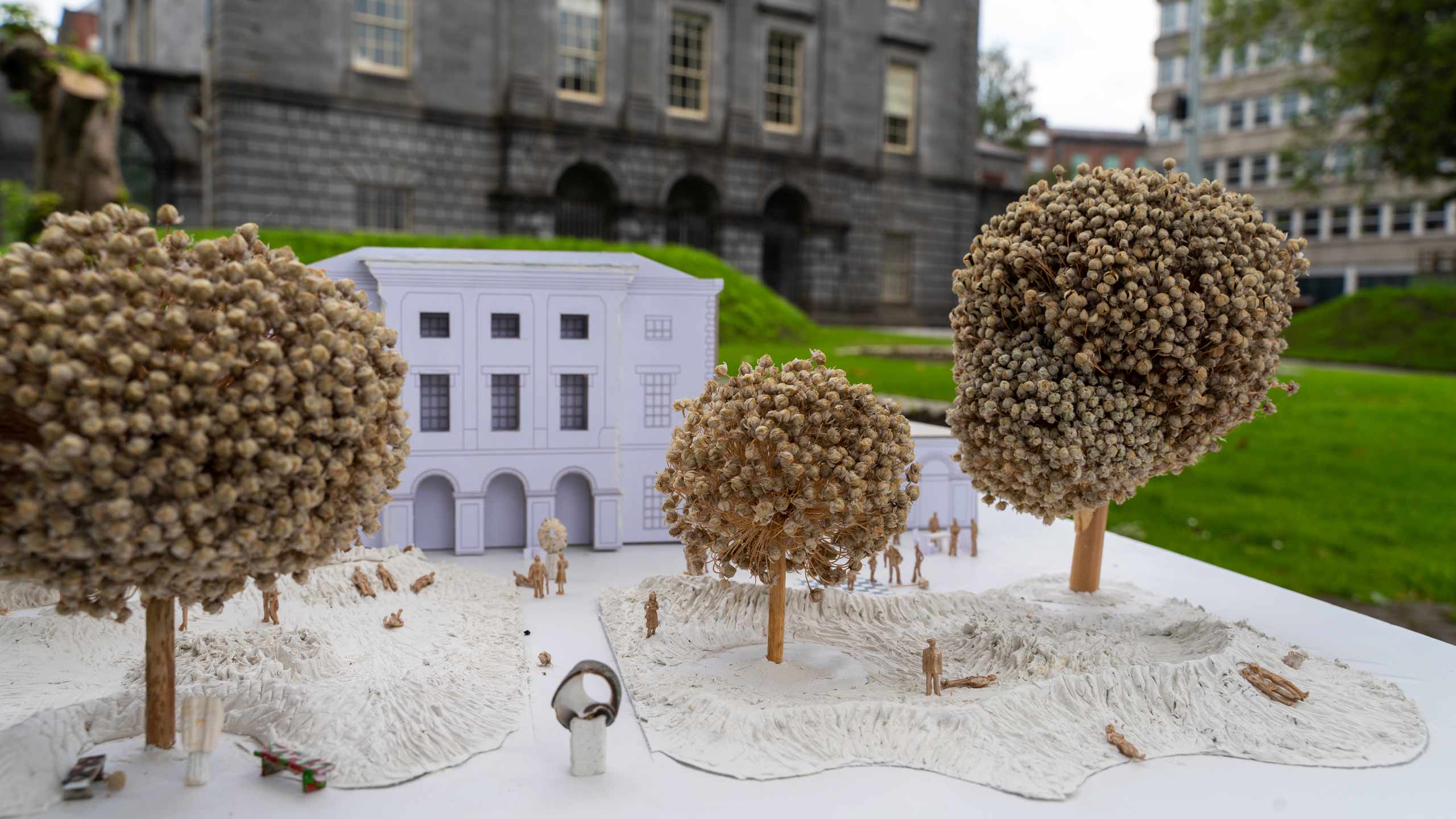 Small scape paper replica of the Hunt Museum building and garden, placed in front of the life size building