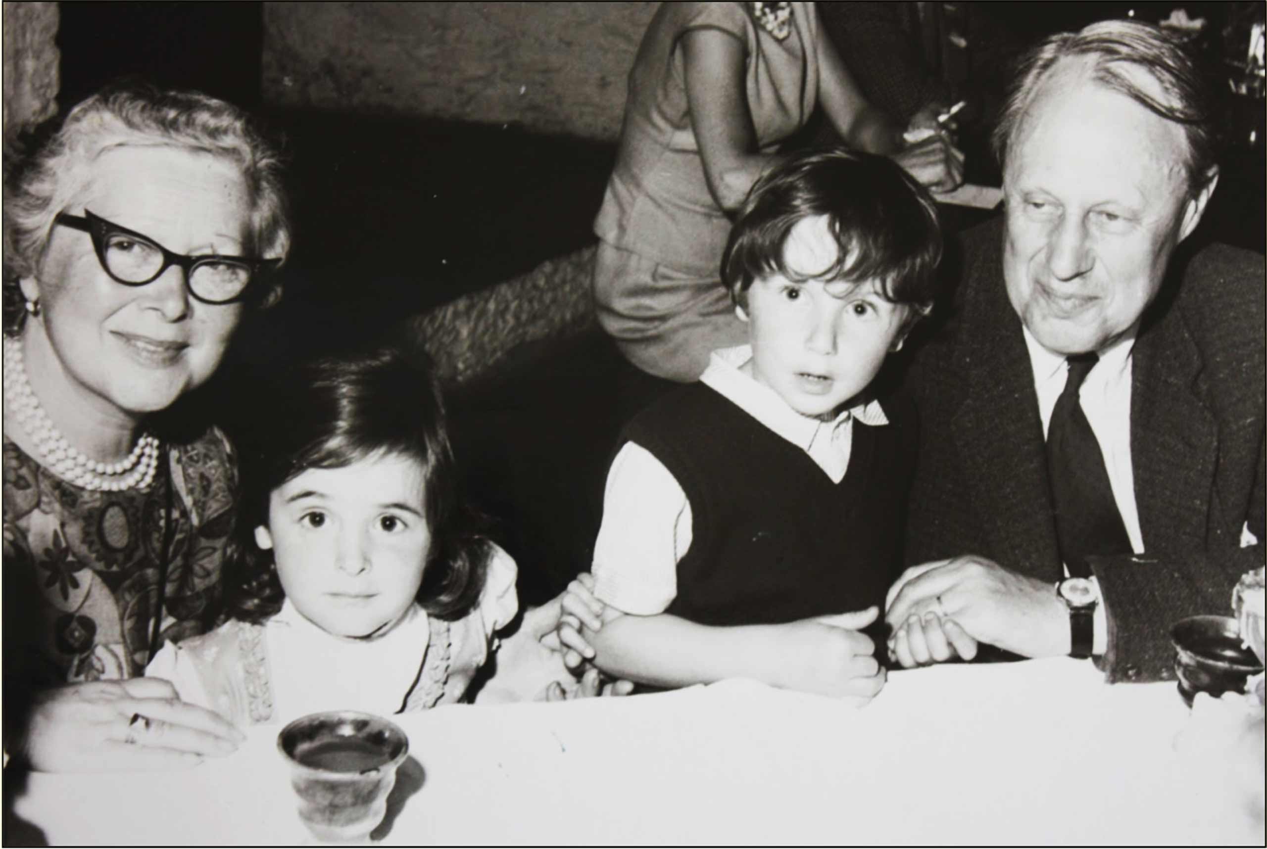 Black and white image of The Hunt Museum family; Gertrude and John Hunt with their two children